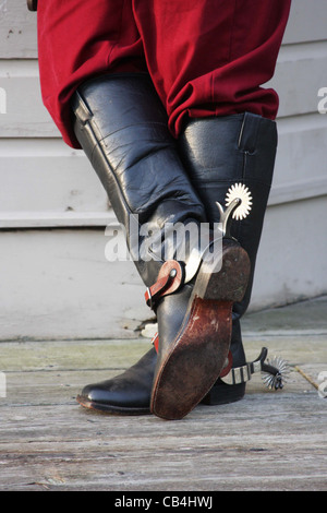 Bottes de cow-boy sur une ancienne ville de l'ouest boardwalk Banque D'Images