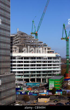 En Construction  La construction des murs de verre de la nouvelle coopérative siège du groupe, l'un Ange Square dans le grand centre-ville de Manchester, Royaume-Uni Banque D'Images