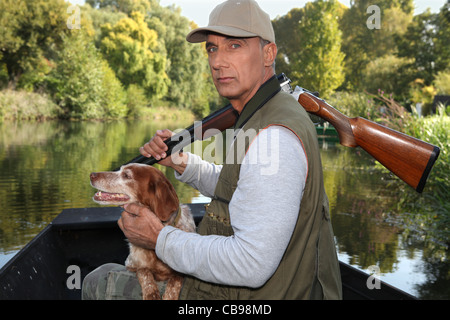 Chasseur et son chien Banque D'Images