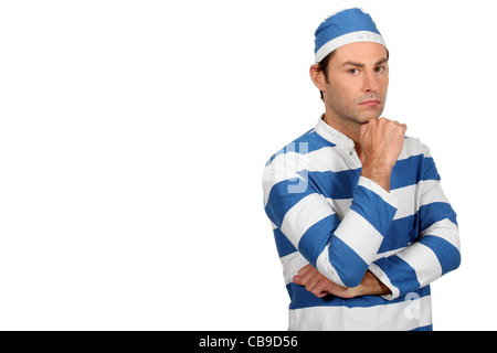 Portrait d'un homme en costume de prisonnier Banque D'Images