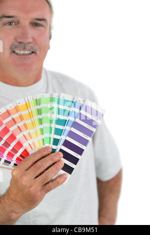 Cartes couleurs Décorateur holding Banque D'Images