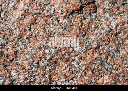 Les feldspath rose et gris granite rock surface Banque D'Images