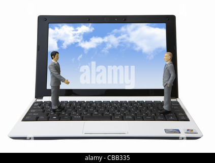 Ordinateur portable avec des nuages sur l'écran et d'affaires miniature Banque D'Images