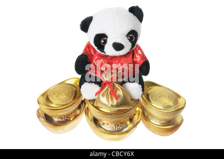 Peluche Panda avec des lingots d'Or Banque D'Images