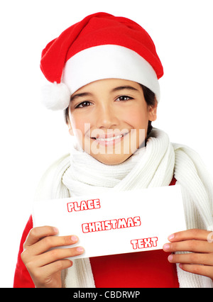 Santa heureux boy smiling, Portrait of a cute teen holding blank card isolé sur fond blanc, kid wearing red Christmas hat Banque D'Images