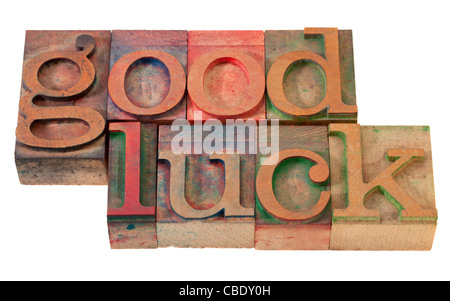 Bonne chance, une expression dans la typographie en bois vintage, blocs colorés avec des encres de couleur, isolated on white Banque D'Images