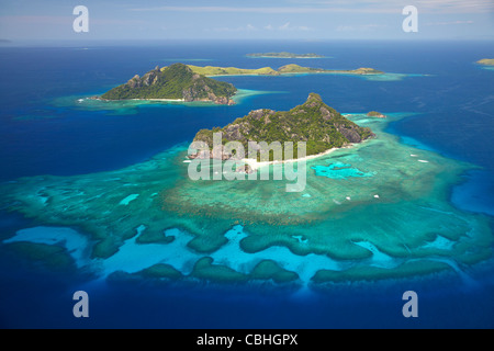 Monuriki Island et de récifs coralliens, Bay Islands, Fidji, Pacifique Sud - vue aérienne Banque D'Images