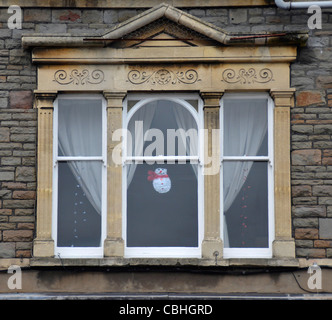 Le Snowman figure dans la fenêtre, Bristol, Royaume-Uni Banque D'Images