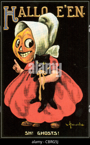 Petite fille Halloween masque citrouille dans & Black Cat Banque D'Images