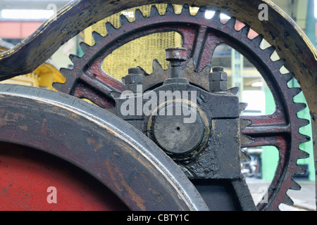 Arrangement de l'appareil mécanique blacklead fond cogs d'engrenage moteur usine ingénierie de conception industrielle de la graisse de l'indu Banque D'Images