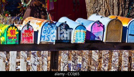 Brightly painted mailboxes in Madrid, New Mexico Stock Photo