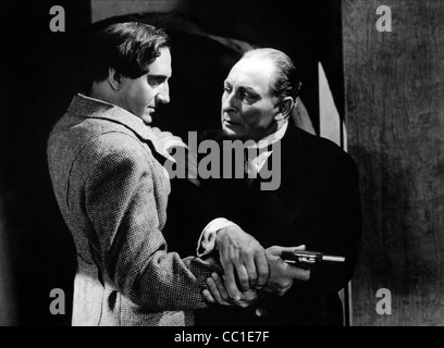 BASIL RATHBONE, Lionel Atwill, SHERLOCK HOLMES ET L'ARME SECRÈTE, 1942 Banque D'Images