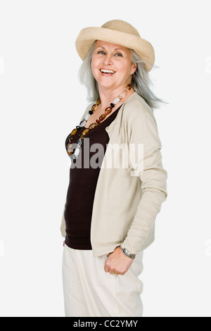 Studio portrait of young woman wearing hat Banque D'Images