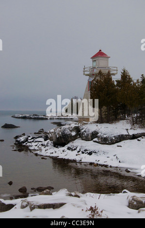 Le phare de South Baymouth en hiver, l'île Manitoulin, en Ontario. Banque D'Images