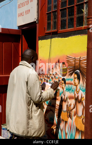 Artiste au travail sur la murale, malealea camp, Lesotho, afrique Banque D'Images