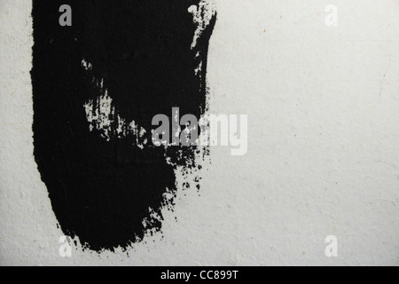Grunge style streak peint en noir sur du papier blanc avec copie espace Banque D'Images