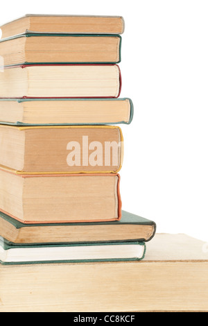 Tas de petits livres sur fond blanc Banque D'Images