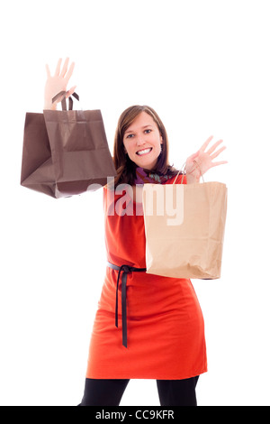 Young happy woman shopping, isolé sur fond blanc. Banque D'Images