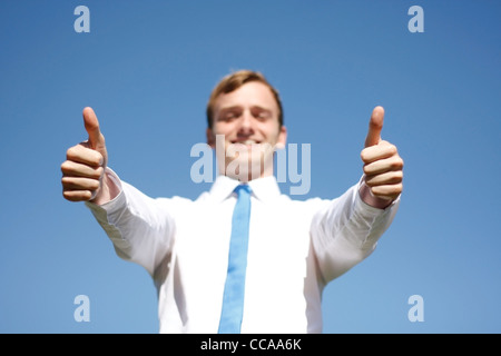 Un business man giving Thumbs up Banque D'Images
