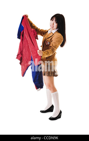 Fille de l'école chinoise à la mode de porter un uniforme scolaire japonais de style désapprouve d'un vilain à uniforme chinois. Banque D'Images