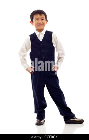 Full Length portrait of a happy little Asian boy isolés sur fond blanc Banque D'Images