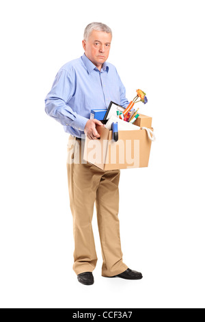 Portrait d'un homme portant un feu fort d'objets personnels Banque D'Images