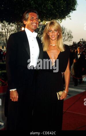 1 janvier 2011 - Hollywood, Californie, États-Unis - 1980 ACADEMY AWARDS.LOS ANGELES, CA.J1177PR. / / / Prix de l'académie des oscars.GEORGE HAMILTON ET LIZ TREADWELL(Image Crédit : Â© Phil Roach/Photos/ZUMAPRESS.com) Globe Banque D'Images