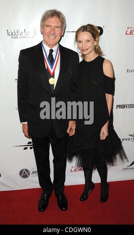 Jan 21, 2011 - Los Angeles, Californie, USA - l'Acteur HARRISON FORD, l'actrice Calista Flockhart lors de la 8e édition de 'Living Legends of aviation" de Los Angeles. (Crédit Image : © Jeff Frank/ZUMAPRESS.com) Banque D'Images