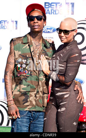 26 juin 2011 - Los Angeles, Californie, USA - Wiz Khalifa et Amber Rose arrivent pour le BET AWARDS Au Shrine Auditorium.(Image Crédit : © Brian Cahn/ZUMAPRESS.com) Banque D'Images