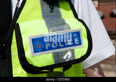 Close up de l'insigne de la police britannique des Transports sur un Gilet haute visibilité, en Angleterre. Banque D'Images