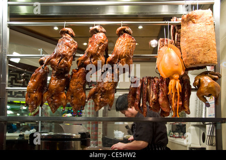 Les canards de Pékin rôti à la fenêtre d'un restaurant chinois - Chinatown - Soho, Londres (UK) Banque D'Images