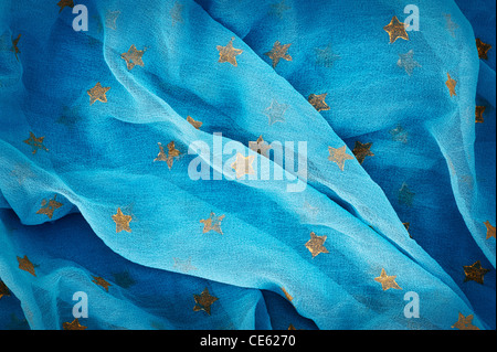 Voile indien bleu avec étoiles d'or abstract Banque D'Images