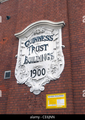 United Kingdom West London fulham palace road Building trust guinness sign Banque D'Images