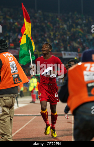 John Pantsil du Ghana porte le drapeau national après le Ghana défait les États-Unis dans une Coupe du Monde de Football 2010 Série de 16 match. Banque D'Images