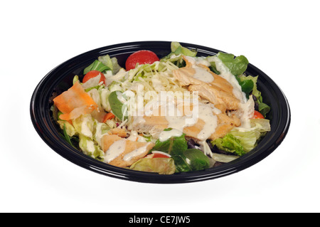 McDonalds salade césar au poulet grillé avec sauce sur fond blanc. Banque D'Images