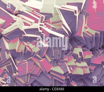 Cristaux de saccharose, couleur de l'analyse des électrons Microphotographie (SEM). Agrandissement : x1250 lors de l'impression à 10 centimètres de large. Banque D'Images