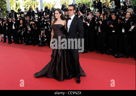 Angelina Jolie et Brad Pitt arriver pour l'examen préalable de l'arbre de la vie au 64e festival international du film, à Cannes. Banque D'Images