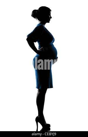 Beau portrait femme enceinte en pleine longueur ossature sur studio isolé sur fond blanc Banque D'Images