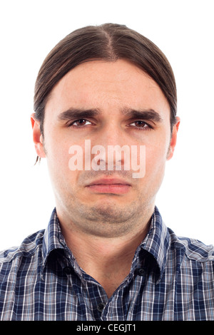 Portrait de jeune homme triste malheureux, isolé sur fond blanc. Banque D'Images