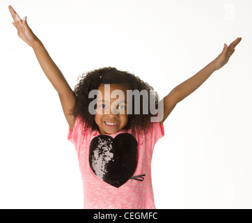 Smiling cute adorable petite fille de 5 ans, première niveleuse, African American Banque D'Images