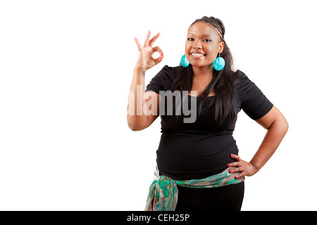 Portrait of a young african american woman making ok geste Banque D'Images