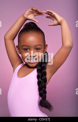 Portrait of a cute little girl dancing Banque D'Images