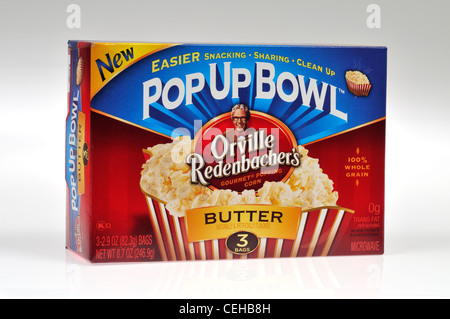 Fort de popcorn micro-ondes bol popup sur fond blanc dentelle USA. Banque D'Images