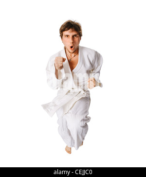 Jeune homme portant un kimono isolé sur fond blanc Banque D'Images