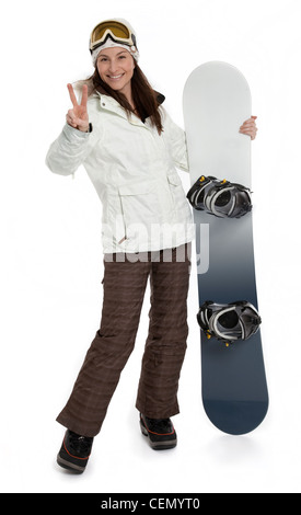 Photo pleine longueur de Pretty woman holding snowboard sur fond blanc. Banque D'Images