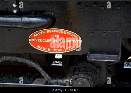 La plaque d'une locomotive à vapeur sur la welsh highland, gwynedd au nord du Pays de Galles UK Banque D'Images