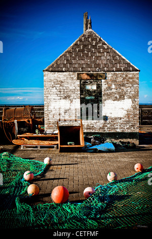 Les filets de pêche disposés sur le plancher à Bristol Harbour. Banque D'Images