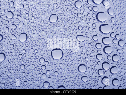 Des gouttes d'eau sur la texture de verre Banque D'Images