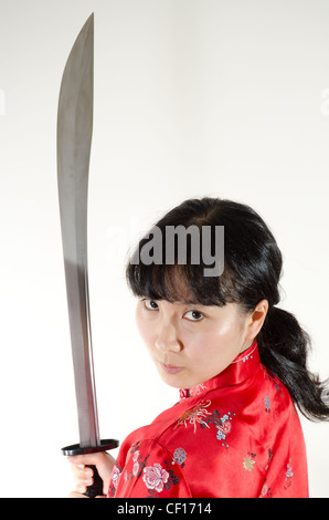 Fille avec épée sur le côté Banque D'Images