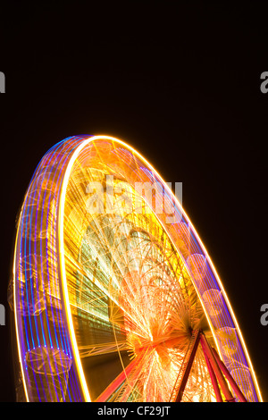 Foire de Noël d'Édimbourg. Grande roue situé près du Scott Monument au Jardins de Princes Street. Banque D'Images